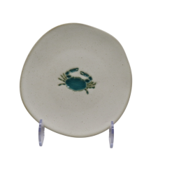 Small ceramic plate with crab design from Travel & Tide