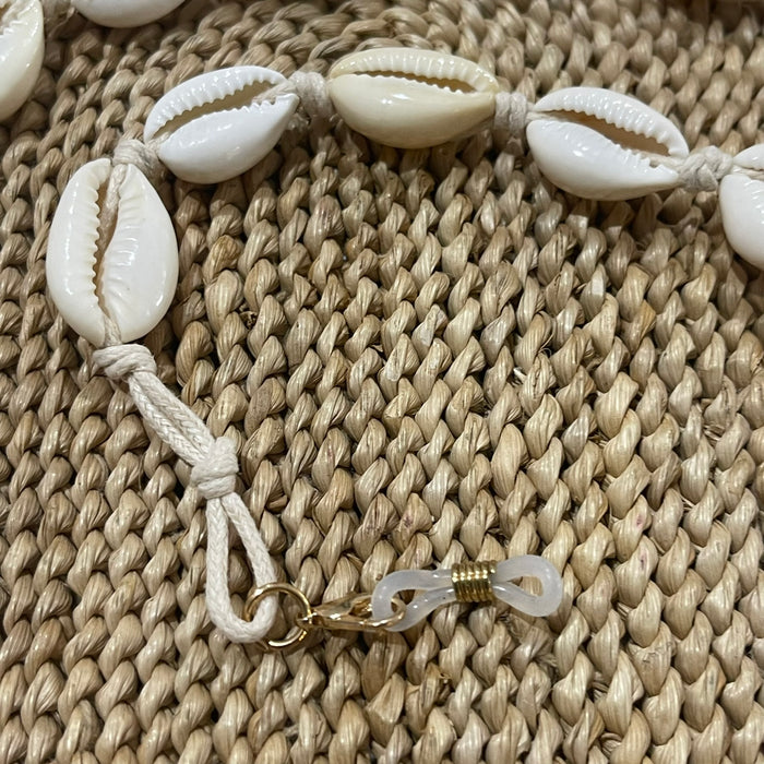 Natural cowrie shell chain for sunglasses showing coastal charm, 64cm summer beach accessory