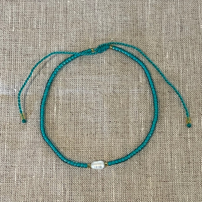 Emerald pearl bead bracelet showing extendable chain and delicate beads