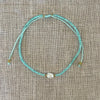 Extendable pearl bead bracelet showing delicate beads and adjustable chain, coastal accessory