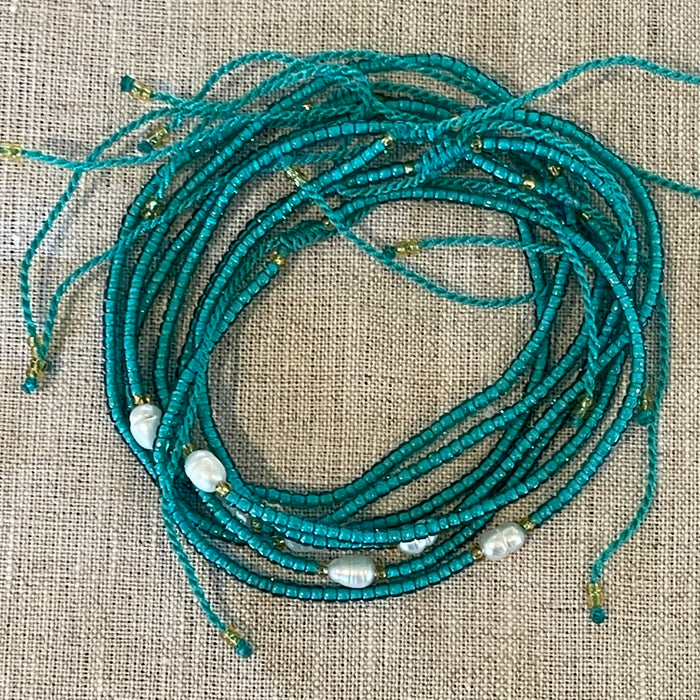 Emerald pearl bead bracelet showing extendable chain and delicate beads