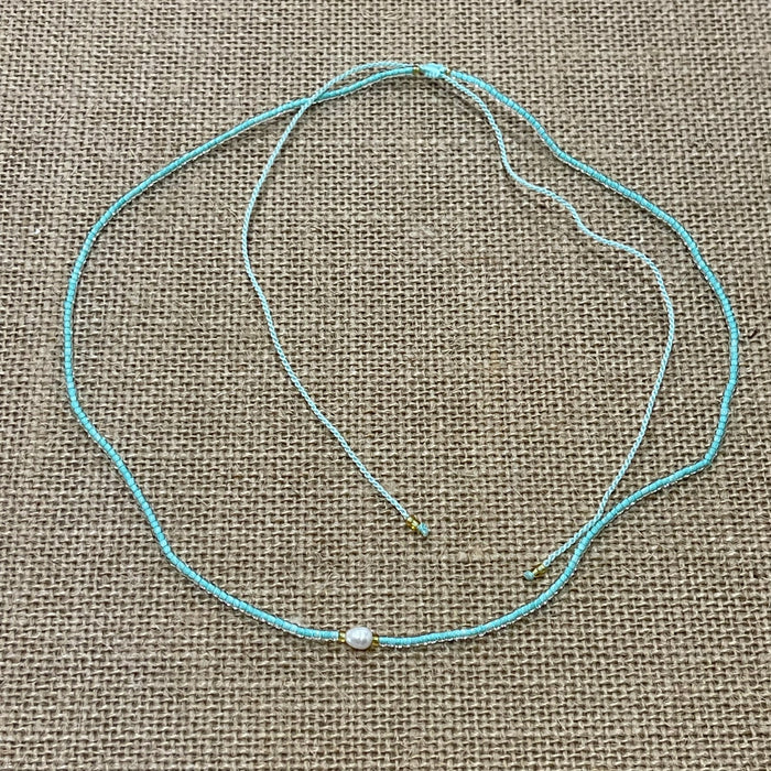Sky blue pearl bead necklace with adjustable fit, delicate coastal jewellery