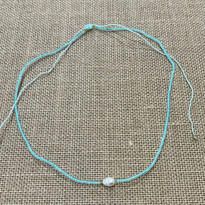 Sky blue pearl bead necklace with adjustable fit, delicate coastal jewellery