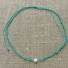 Mint pearl bead necklace showing single pearl and ocean beads, coastal accessory