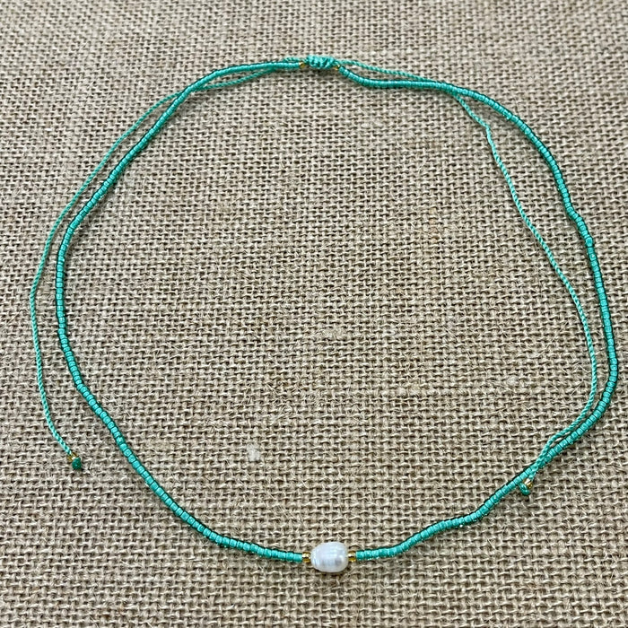 Mint pearl bead necklace showing single pearl and ocean beads, coastal accessory
