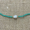 Mint pearl bead necklace showing single pearl and ocean beads, coastal accessory