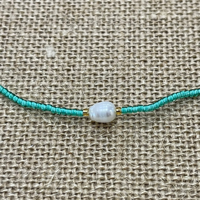 Mint pearl bead necklace showing single pearl and ocean beads, coastal accessory