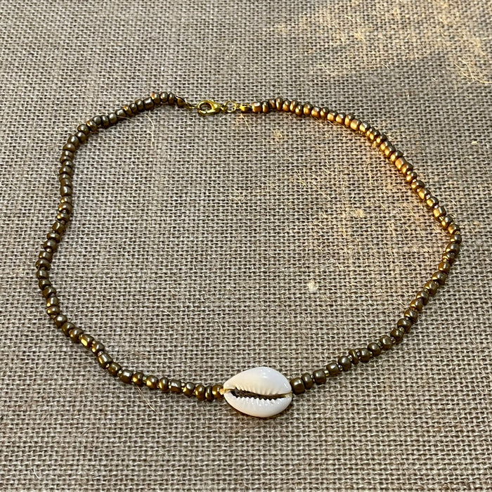 Bronze cowrie shell beaded necklace showing natural shells and beads, coastal accessory