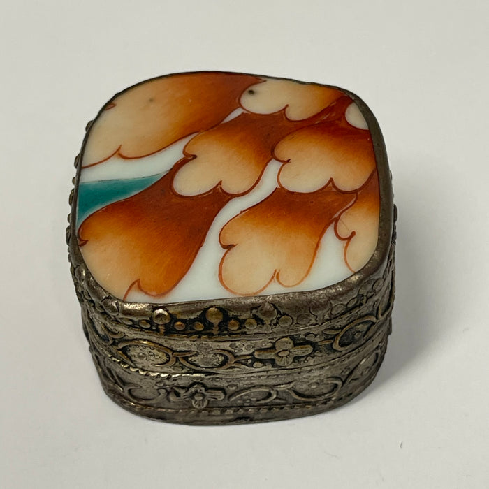 Vintage metal tins with ceramic lid inlay