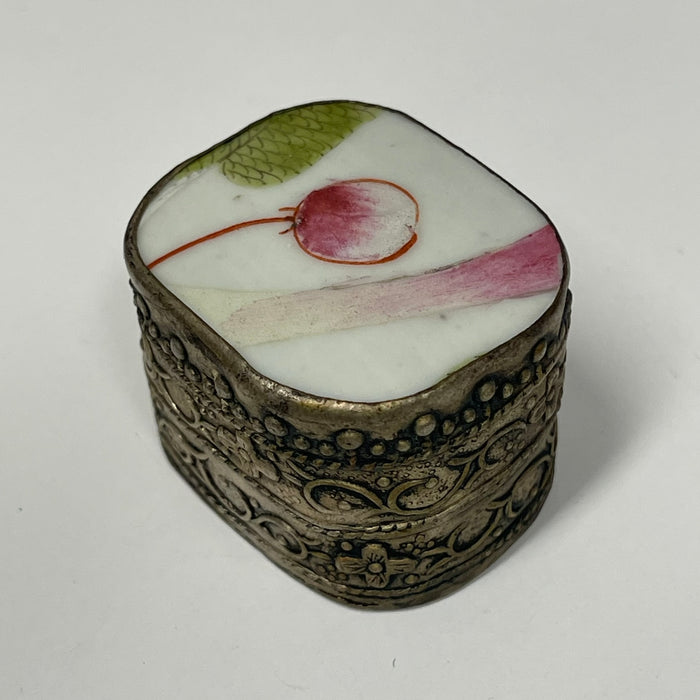 Vintage metal tins with ceramic lid inlay