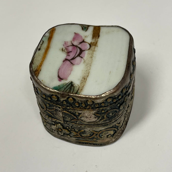 Vintage metal tins with ceramic lid inlay