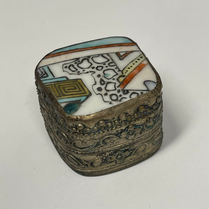Vintage metal tins with ceramic lid inlay