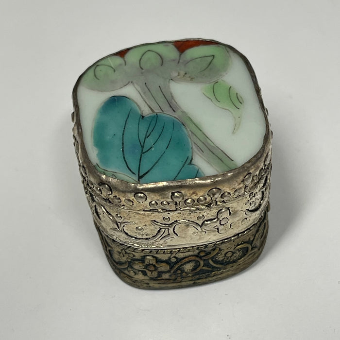 Vintage metal tins with ceramic lid inlay