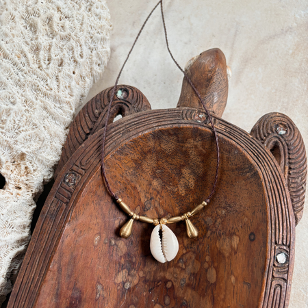Cowrie brass teardrop necklace with natural shell and hammered brass pendant, handcrafted coastal bohemian jewellery