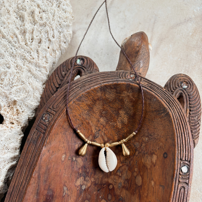 Cowrie brass teardrop necklace with natural shell and hammered brass pendant, handcrafted coastal bohemian jewellery