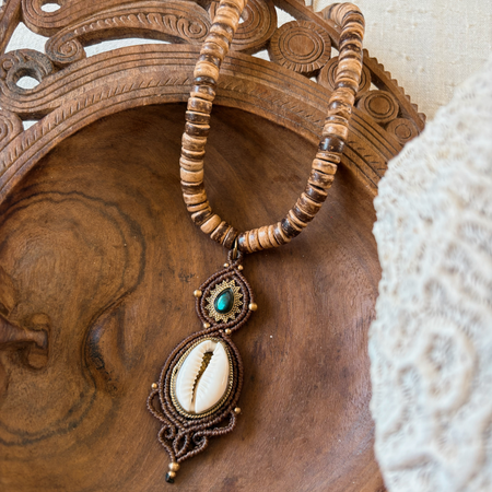 Cowrie and labradorite macrame necklace with natural shell, iridescent gemstone and handcrafted coastal design