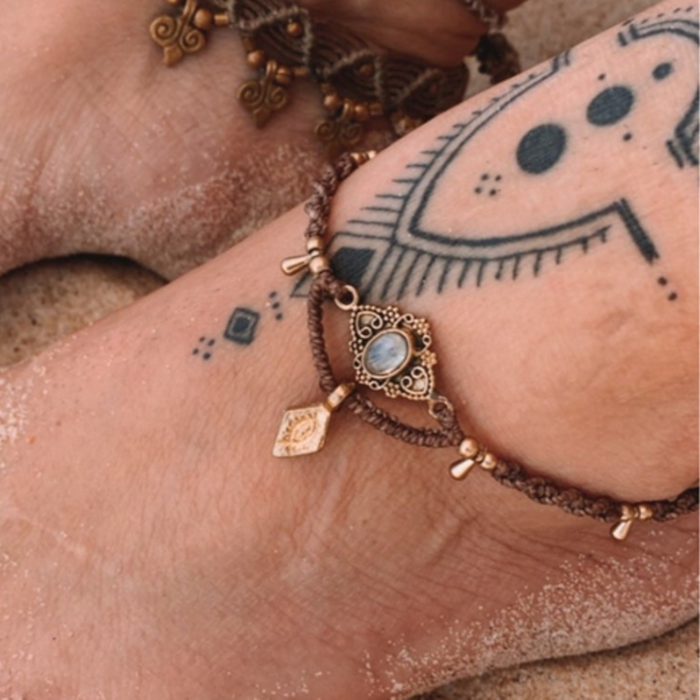 Handmade moonstone charm anklet with natural gemstones, brass beads and charms on waxed cord