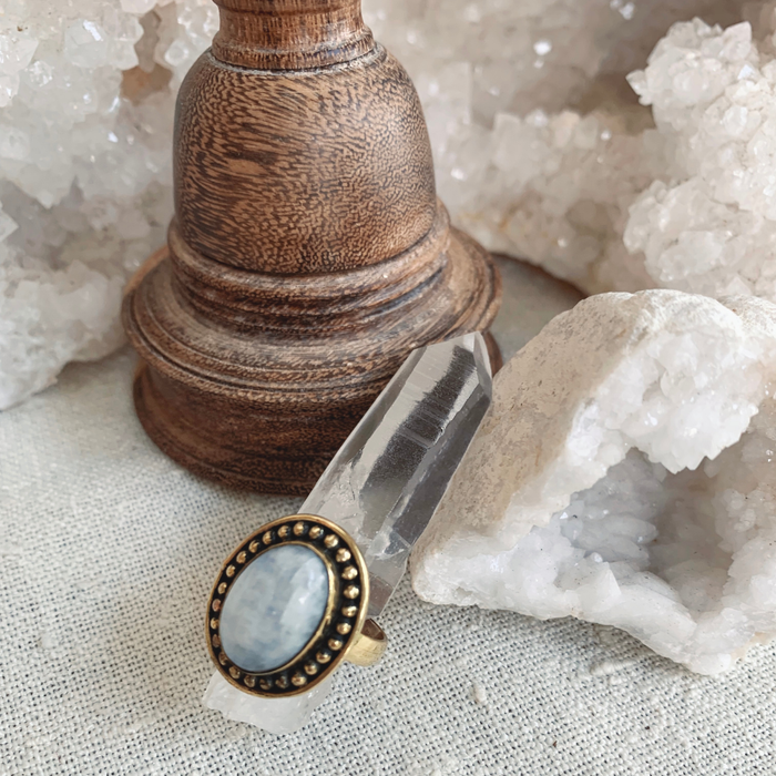 Purnima moonstone ring with luminous white stone set in sterling silver, reflecting ocean-inspired coastal elegance