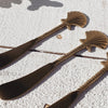 Brass seashell cheese knife styled for entertaining