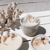 Oceana ceramic candle with seashells, turquoise crystals, and dried botanicals