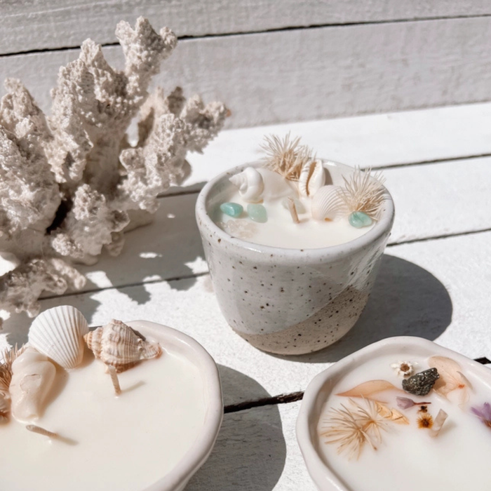 Oceana ceramic candle with seashells, turquoise crystals, and dried botanicals