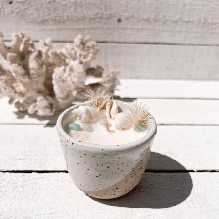 Oceana ceramic candle with seashells, turquoise crystals, and dried botanicals