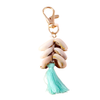 owrie tassel keyring with six natural shells on gold keyring and sky blue tassel, 11.5cm coastal accessory