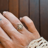 Bohemian sterling silver mandala ring worn showing delicate spiritual design