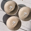 Soleil medium flat palm bowl with hand-pressed palm tree motif