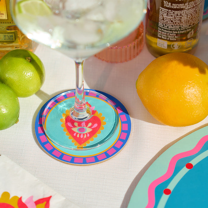 Brighten your table with this 6-piece Fiesta coaster set! Heat-resistant, cork-backed & easy to clean—perfect for coastal homes & gifting.